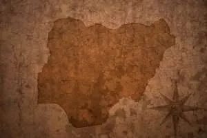 Nigeria Map on a Old Vintage Crack Paper Background