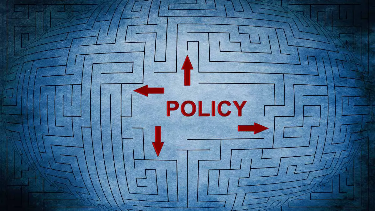 Featured Image for Essay Title the Value of Sociology in the Policy Sphere, by Juan Villasmil Showing the Word "policy" in the Middle of a Maze with Multiple Starting Locations.
