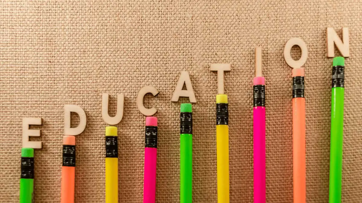 Blog Photo for the Essay Titled "realizing an Educated World Community Through the Sociology of Education" Showing Colorful Pencils with the Letters to Spell "education" Sitting Atop of Them.