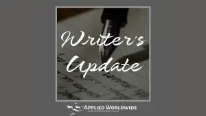 Graphic for Applied Worldwide's Writer's Update Publication Series Showing the Words "writer's Update" over an Image of a Pen Writing on Notebook Paper.