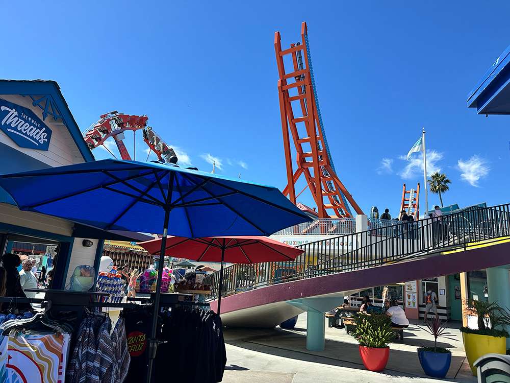 Views of rides against the blue sky at the Santa Cruz Beach Boardwalk